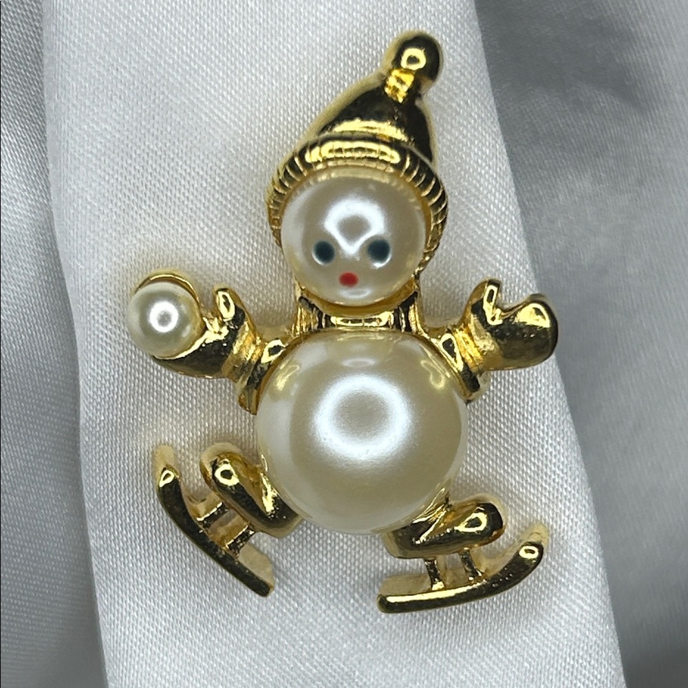 Vintage & sweet! Gold and Pearl Snowman Brooch with ice skates on.